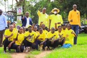 President Museveni with the skilling hub graduates during the rally.
