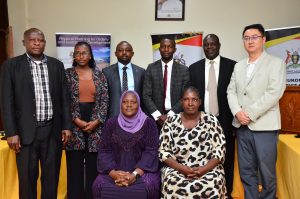 RDC Hajjati Ndisaba of Mukono ,Under secretary Ms Monica GKMA-UDP ,CAO Ddamba,Vice Chairperson LCV Kabali and other leaders with Contractors after signing the Contract